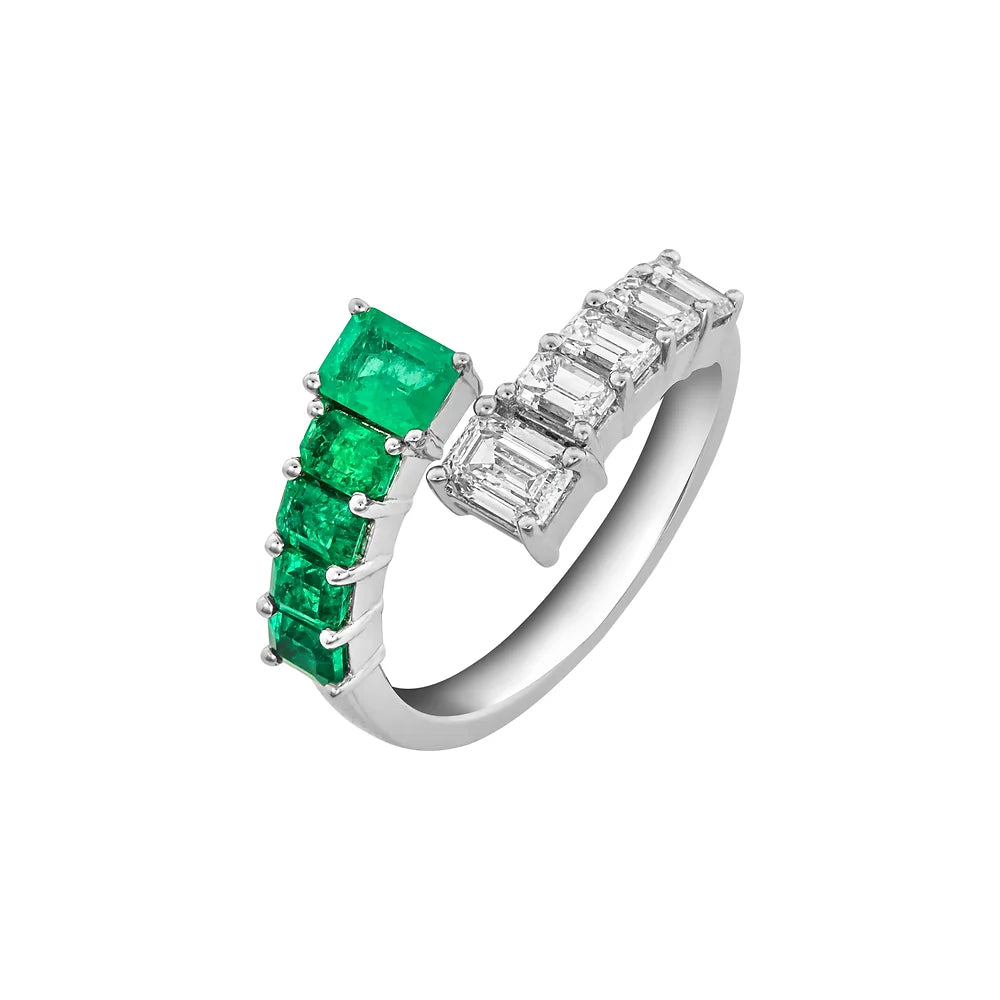 Gradual emerald cut emeralds mix with emerald cut diamonds in a coil ring design