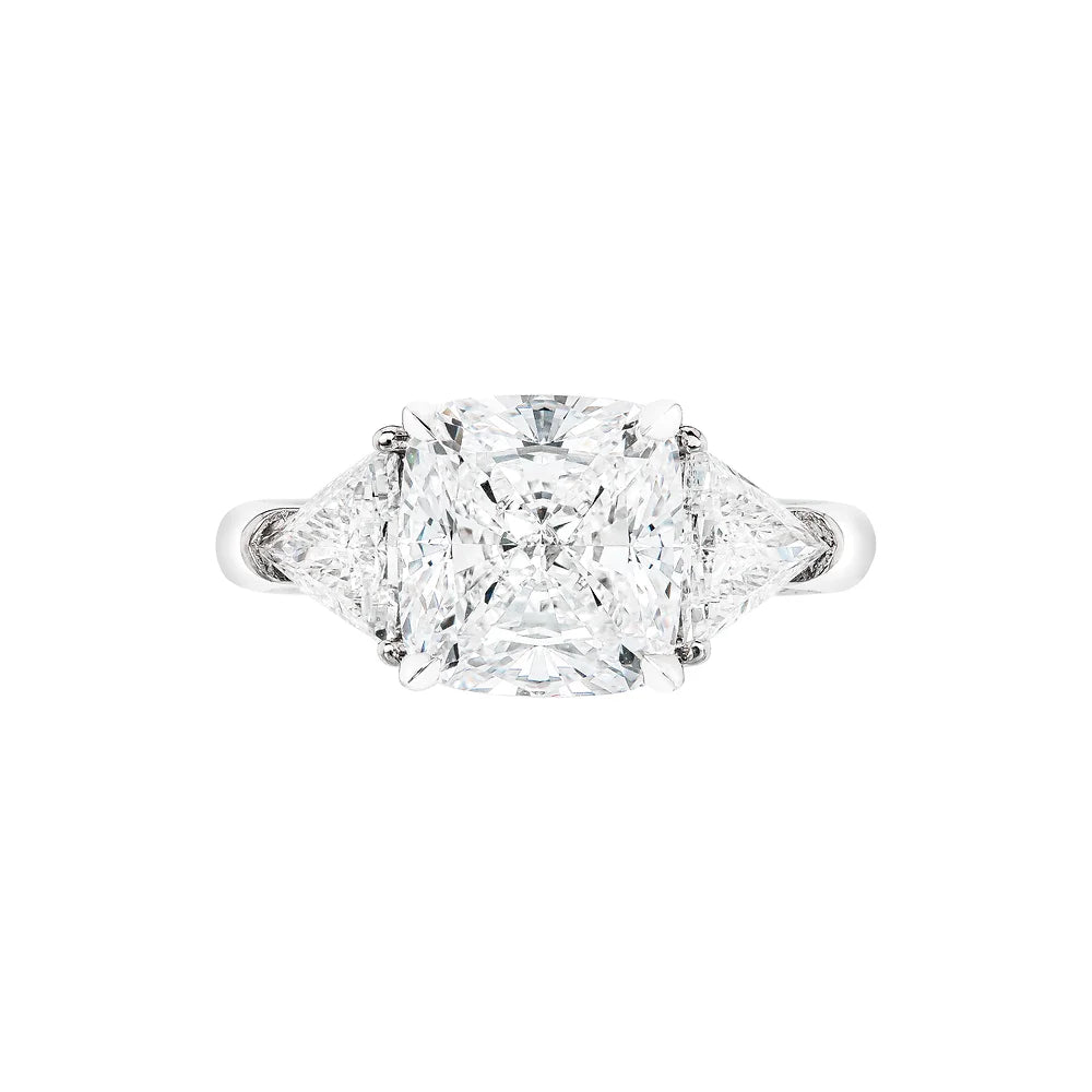 White gold Three Stone Ring on white background.