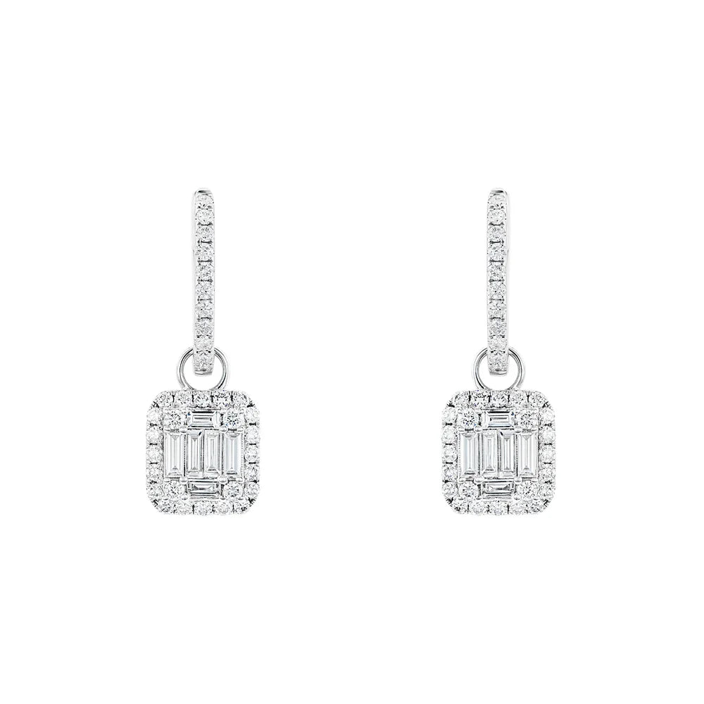 White gold Illusion Emerald Cut Diamond Dangling Earrings on white background.