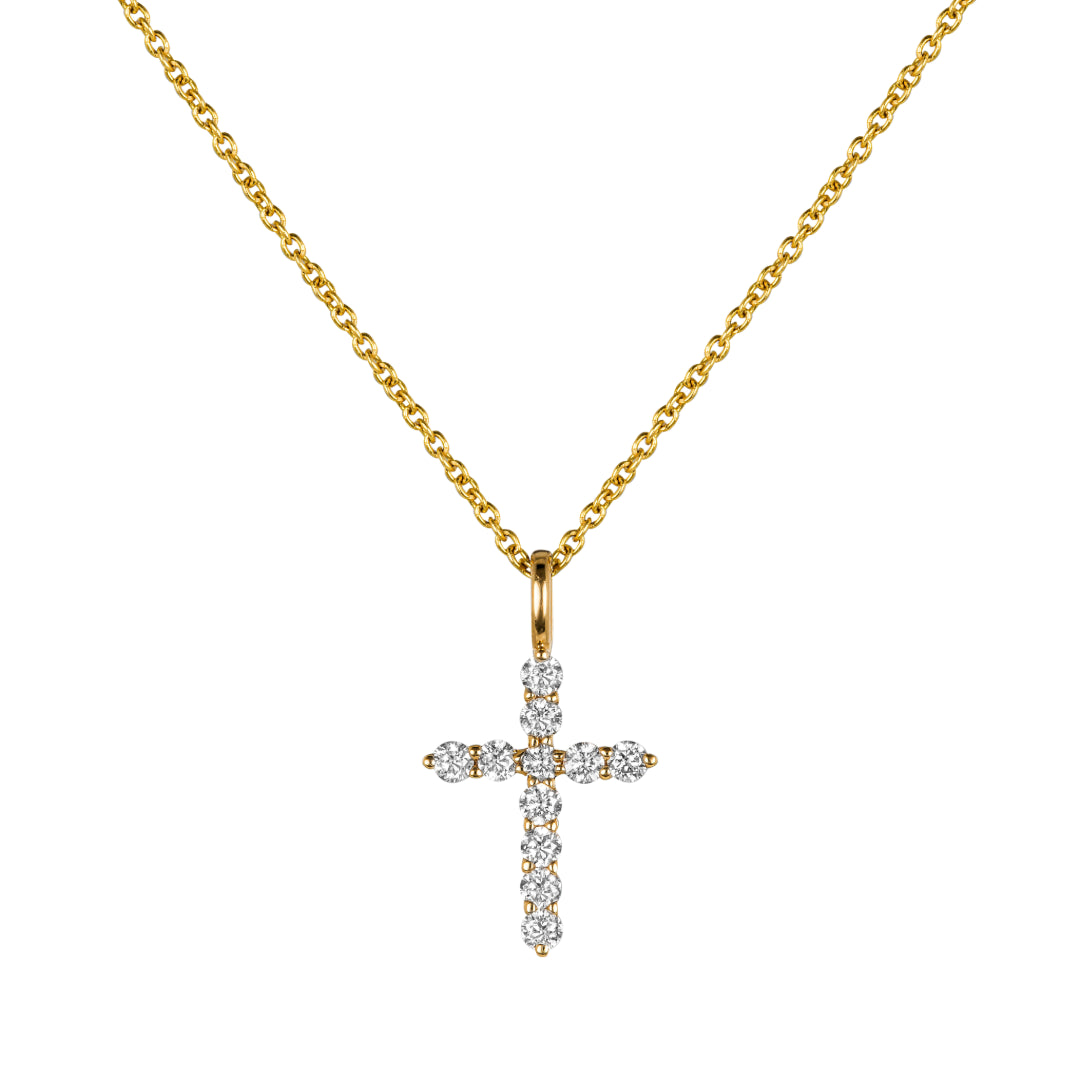 Yellow gold diamond cross necklace on white background