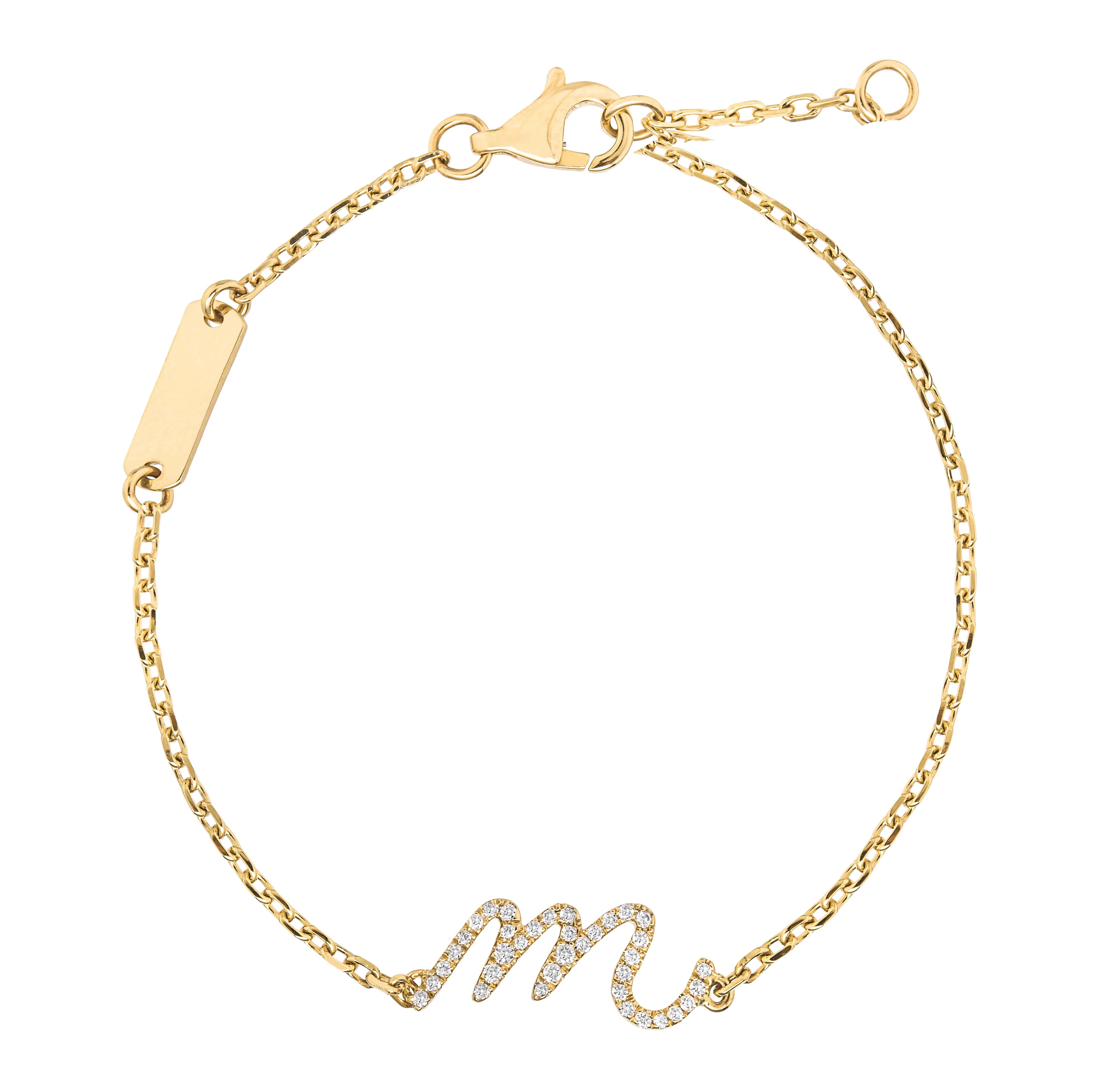 Yellow Gold diamond bracelet with a letter 'M' on white background