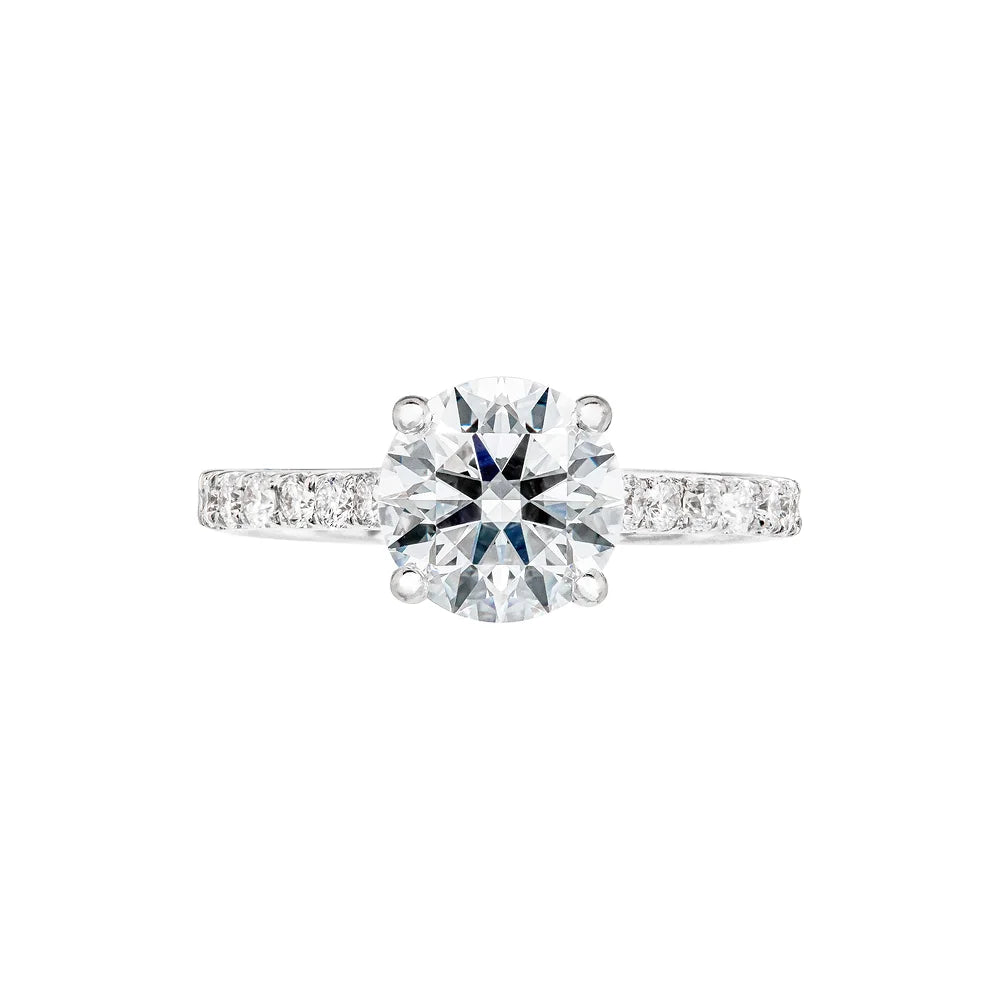 White gold round diamond pavé band Engagement Ring on white background.