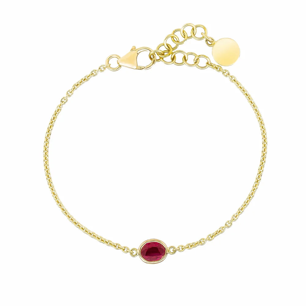 Yellow Gold Ruby Birthstone Baby Bracelet on white background.