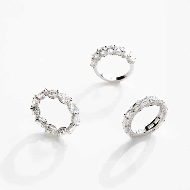 White gold Sideway Emerald Eternity Ring on white background