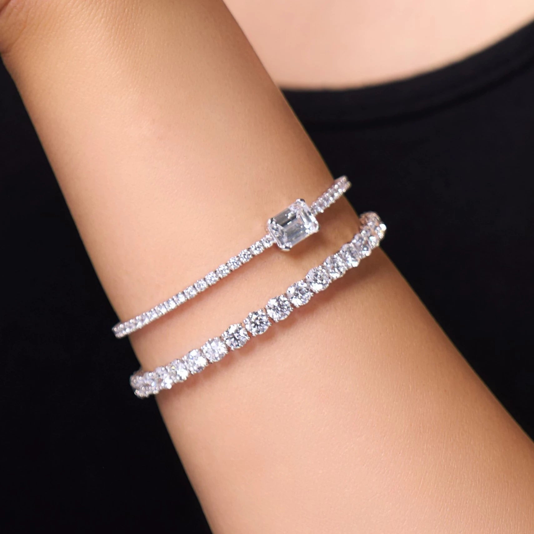 Tennis Bracelet with Emerald Diamond Center Stone