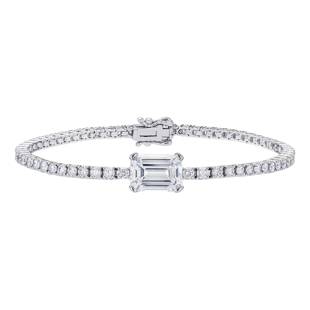 White Gold Tennis Bracelet with Emerald Diamond on white background.